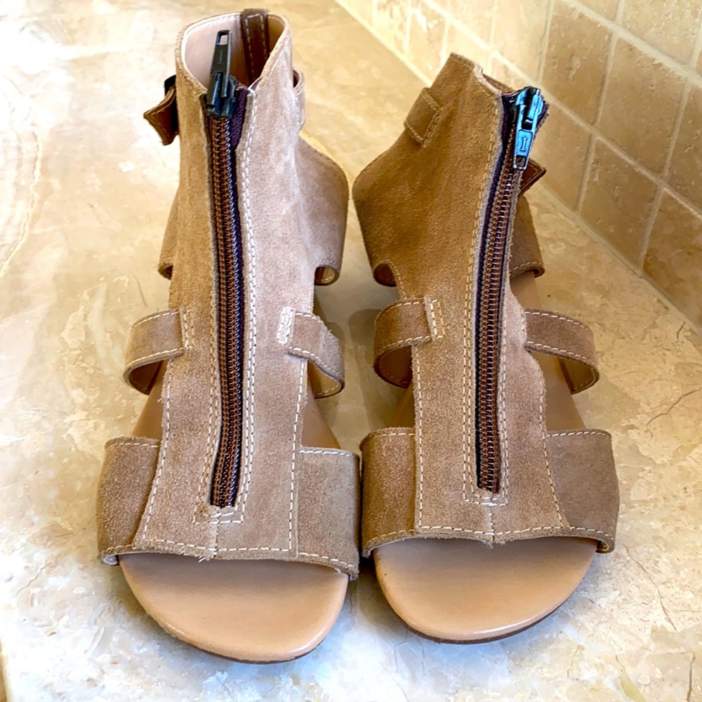 Adorable suede zipper front sandals.  Very low wedge. In excellent condition.